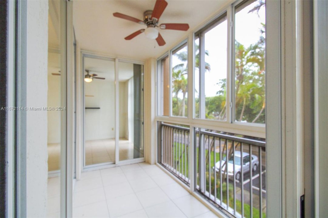 Balcony enclosed with Hurricane Impact Windows