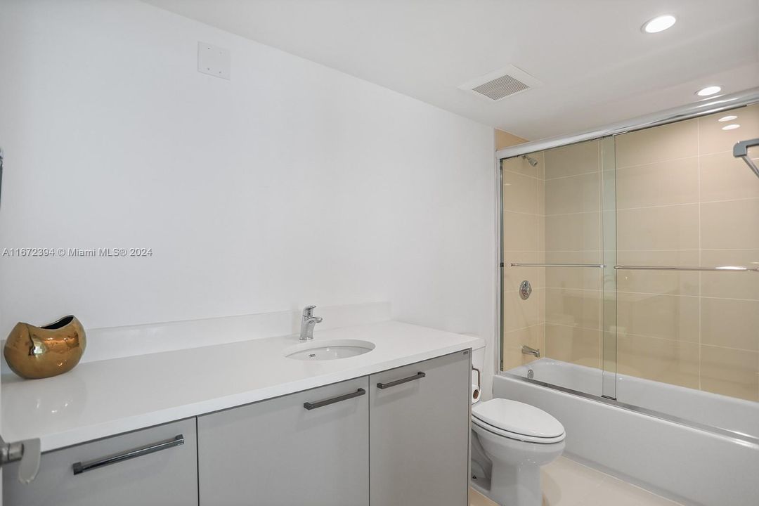 Photo is of a similar staged and furnished model unit. Actual property is unfurnished, decorator ready.