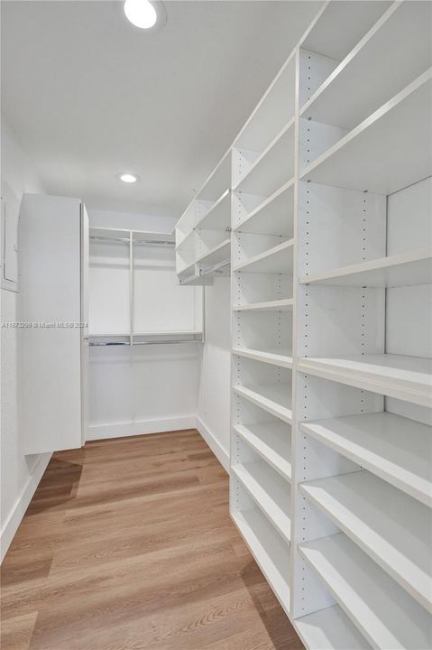 Custom walk in closet in the primary suite