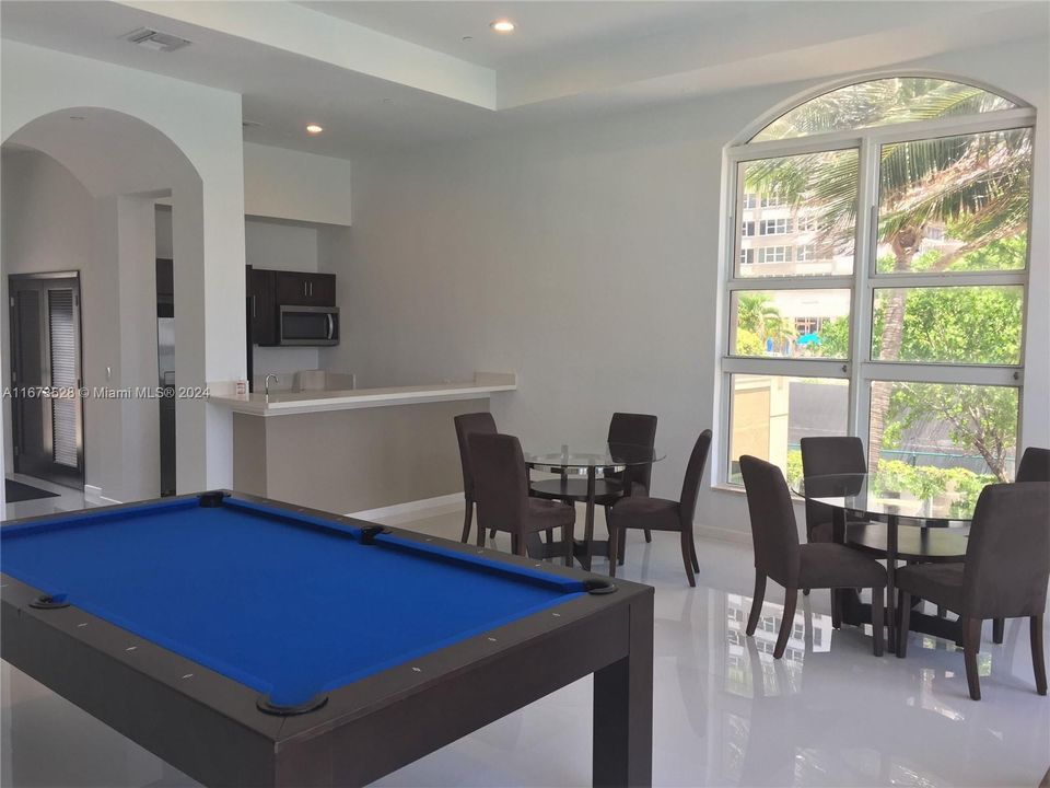 Clubhouse with pool table and kitchen