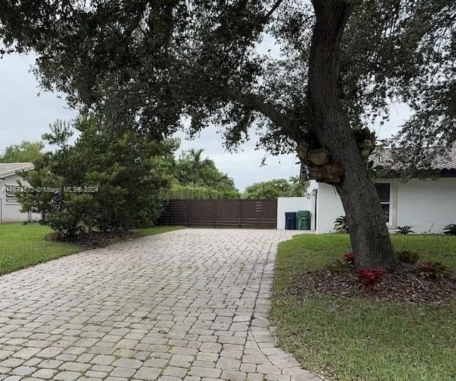 Driveway leading to garage