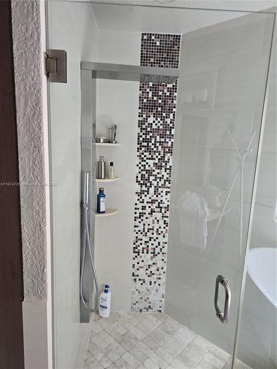 Shower with thermostatic shower panel