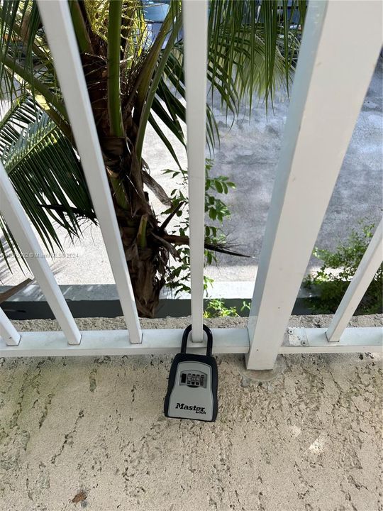 lockbox located in front of door on rail