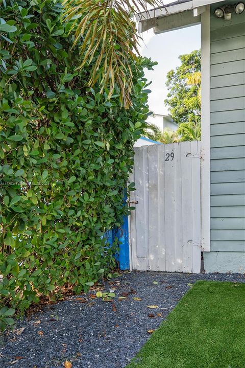 private east entry to cottage from street