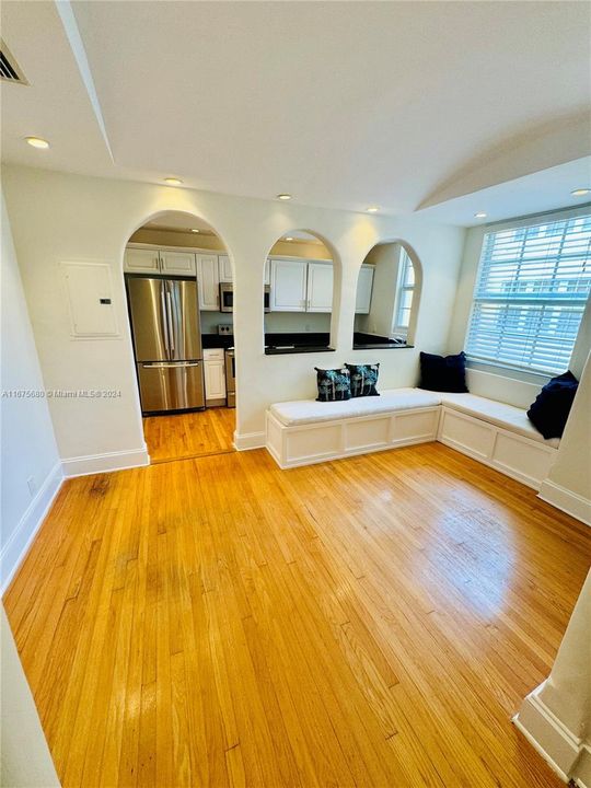 Dining area with built in benches with extra storage underneath.