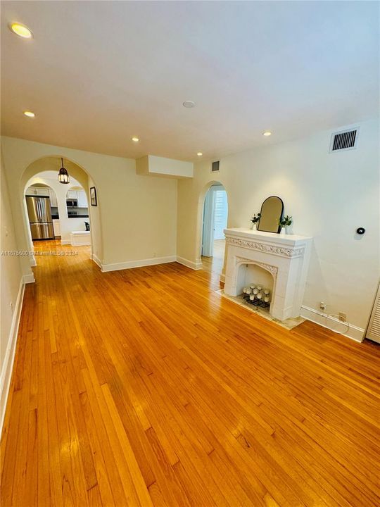 Spacious Living room space with recessed lighting