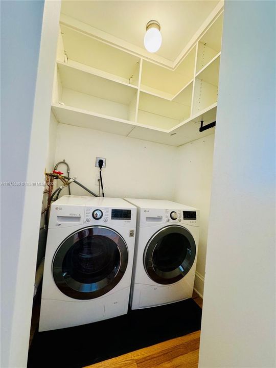 LG Washer and dryer in the unit with plenty of extra storage space!