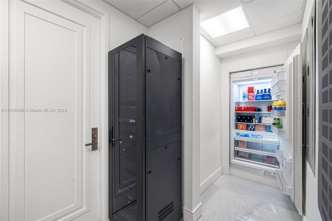 Utility Room With Control4 Technology And Sub Zero Fridge