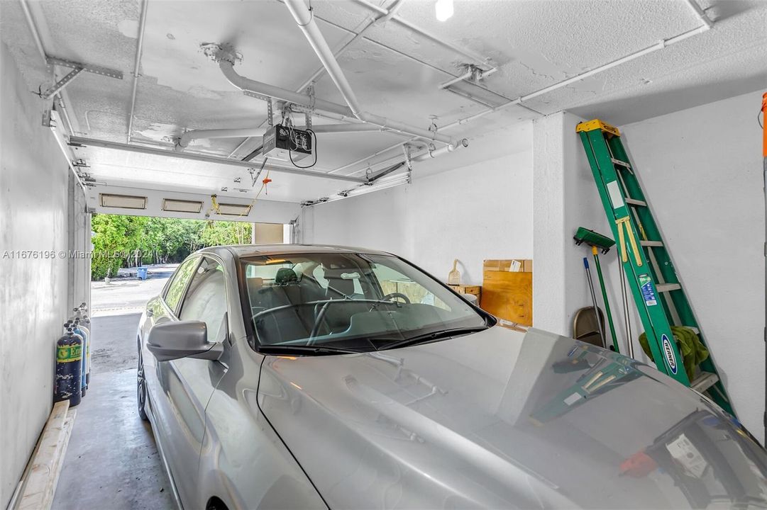 garage, plus two cars will fit in driveway