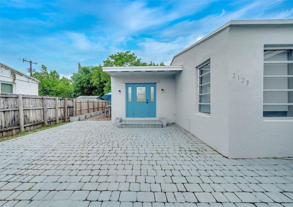 Beyond the gate...Front and side patio areas