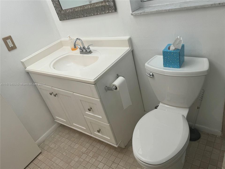 NEW TOILET & VANITY