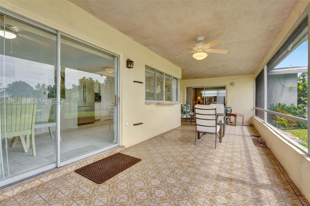 Large covered patio with option to enclose for more indoor living space