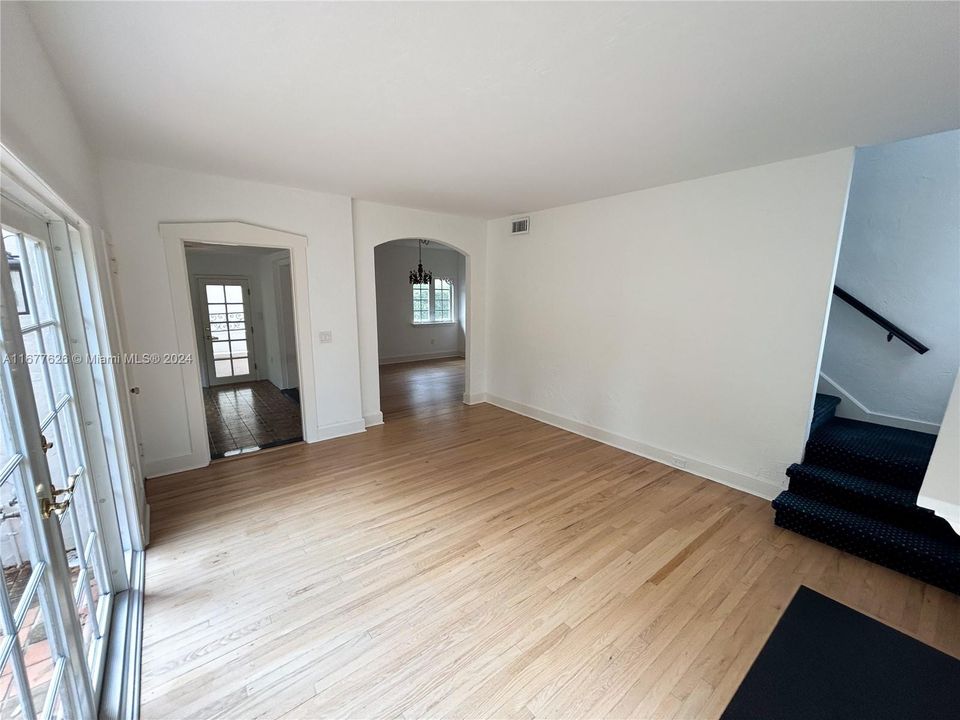 Family Room showing the entrances to the foyer and dining area