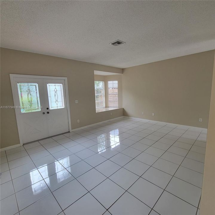 Living Room has a Bay Window with seating.