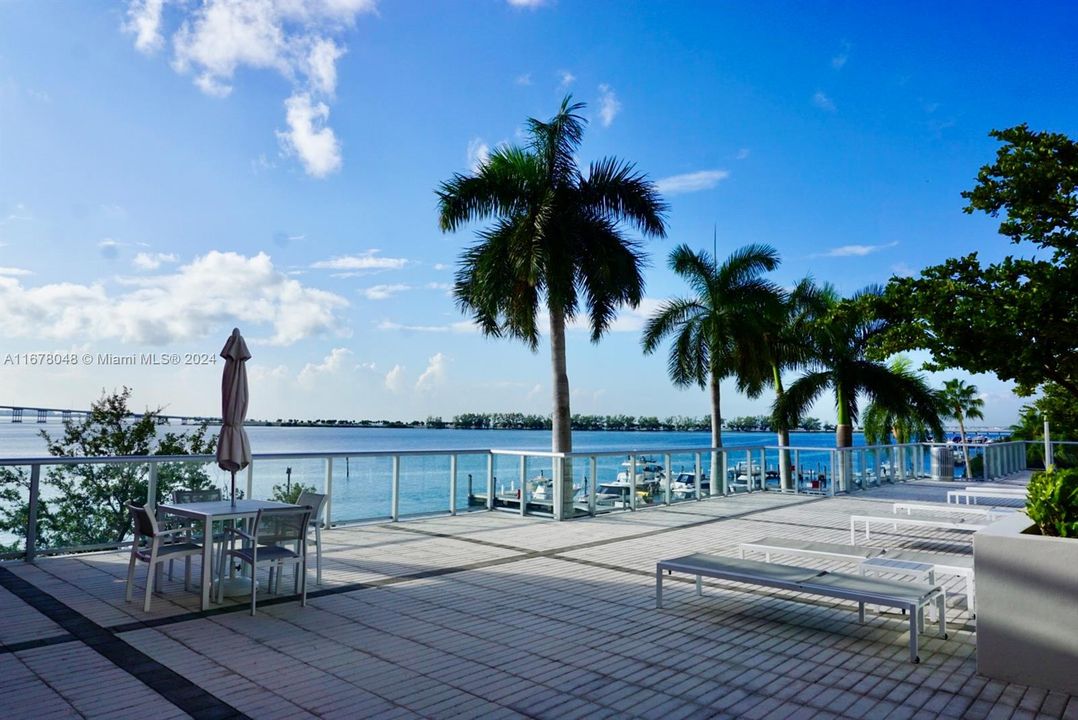 Spacious and inviting water front pool deck