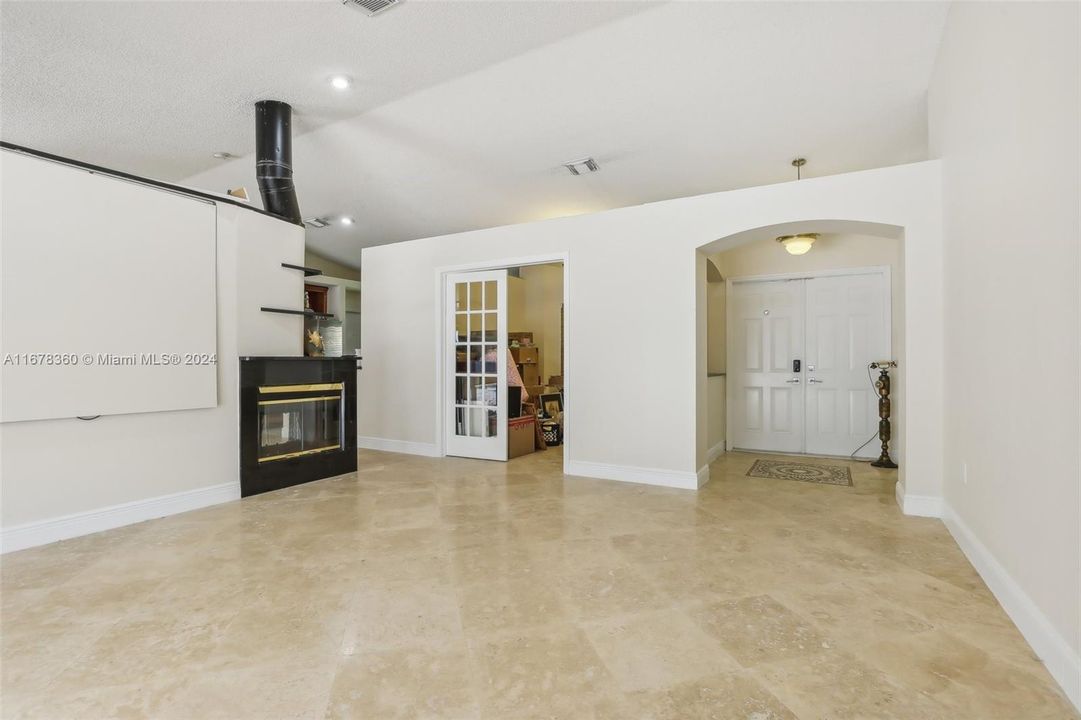 Another Living Room view to Front Doors & Dining Room