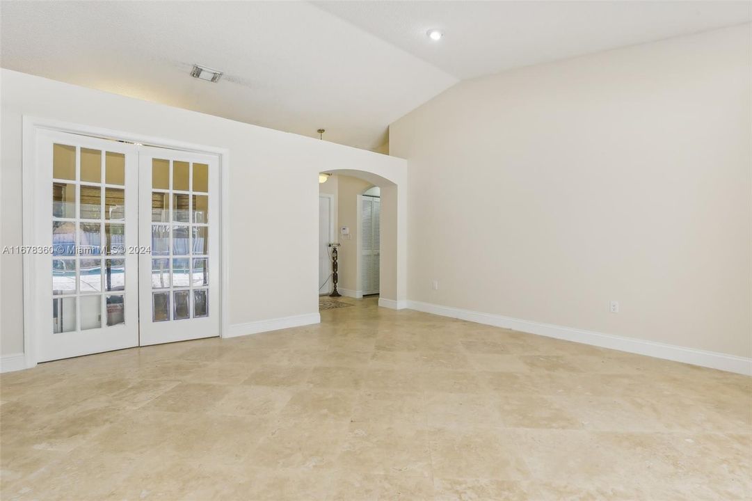 Living Room looking into Dining Room with French Doors