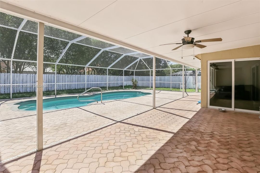 Large covered patio by the pool area