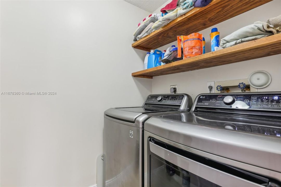 Indoor Laundry Room with shelvings