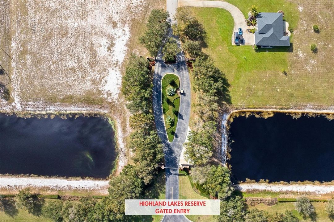 Aerial view of private entry at Highland Lakes Reserve off Sparta Rd. Located 90 minutes south of Orlando and 70 minutes southeast of Tampa. The $1,500 annual Homeowner Association Fee covers maintenance of common areas, road upkeep and gated entrances, as well as private access to the community's boat ramp and docks. Whether you enjoy fishing, boating or simply taking in the natural beauty, embrace the lifestyle of Highland Lakes Reserve. To view all documents and HOA guidelines, visit www.hlrsebring.com.