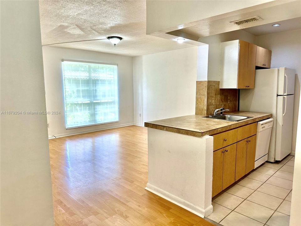 Giant window in living room adds a lot of light.