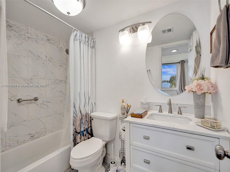 Guest bedroom with tub