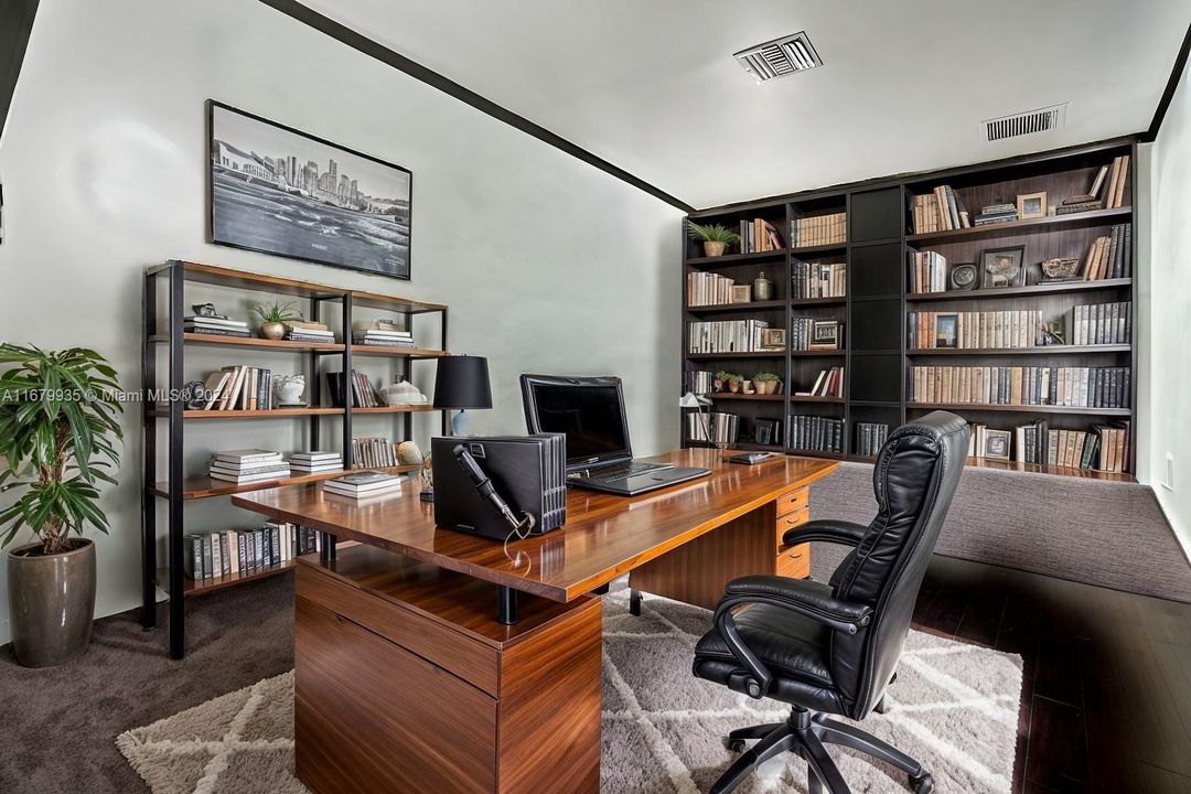 A brightly lit office with an industrial modern style, perfect for work and studying.