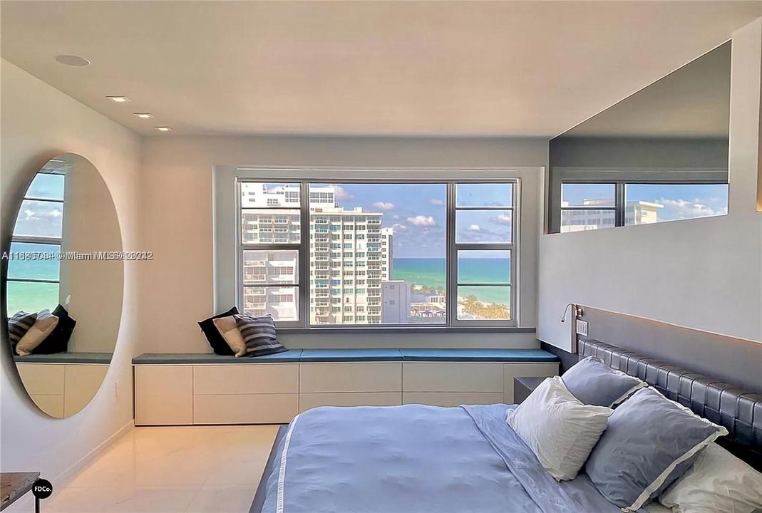 Master bedroom with views of Ocean. Can relax in bed and watch the waves