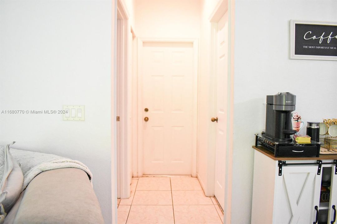 laundry room, garage and half bathroom. entry/exit passage way.