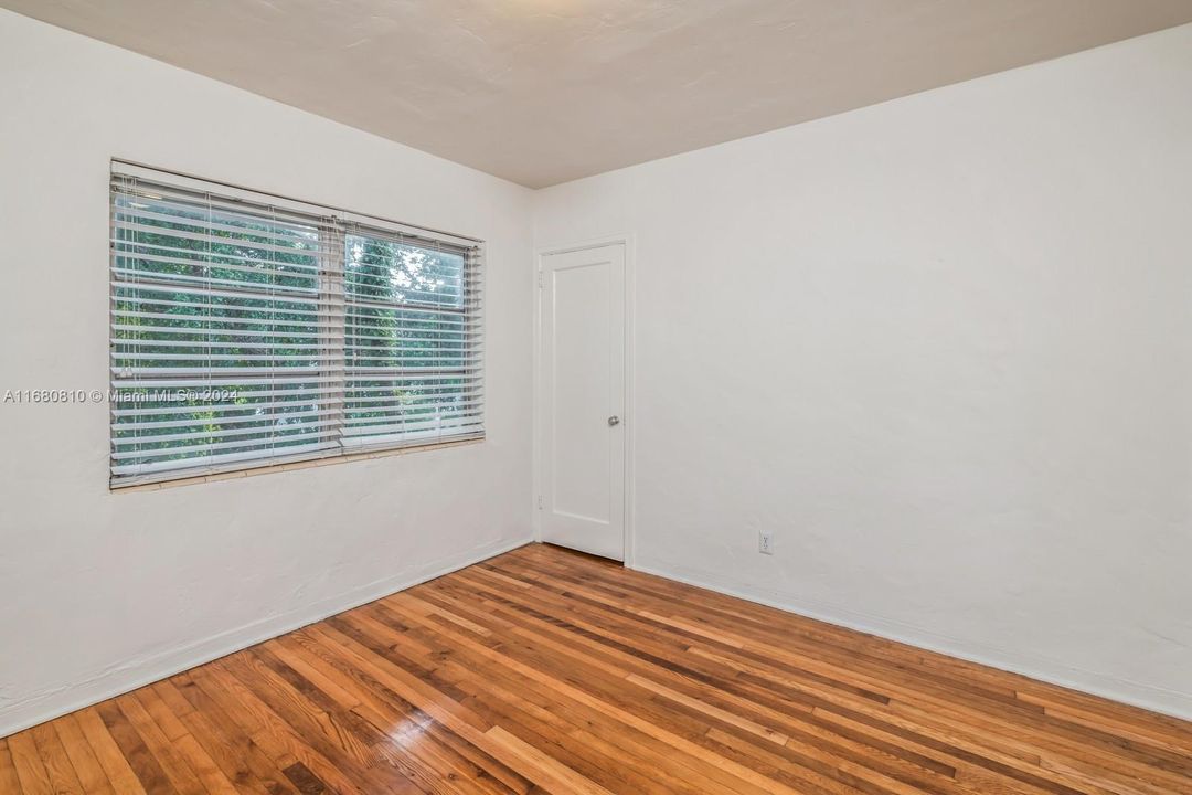 Second floor unit with lots of windows.