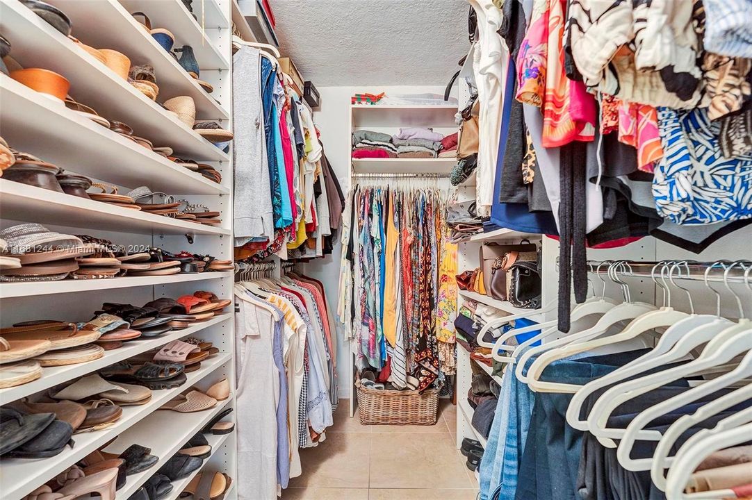 Master walk-in closet with built-ins.