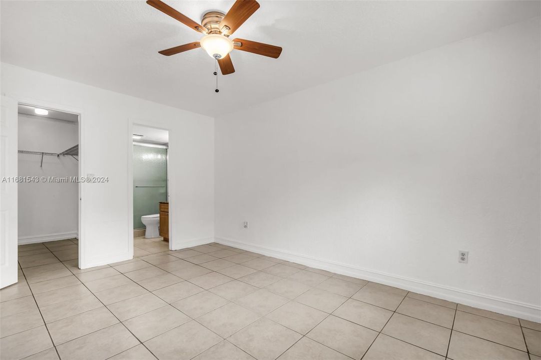 Primary w/ Walk In Closet and Shower.