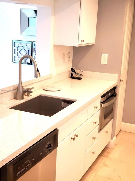 New cabinets and quartz counters