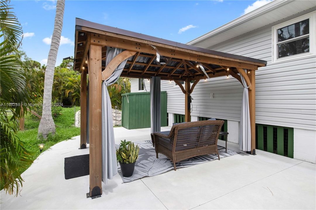 Covered patio area off the back of the house