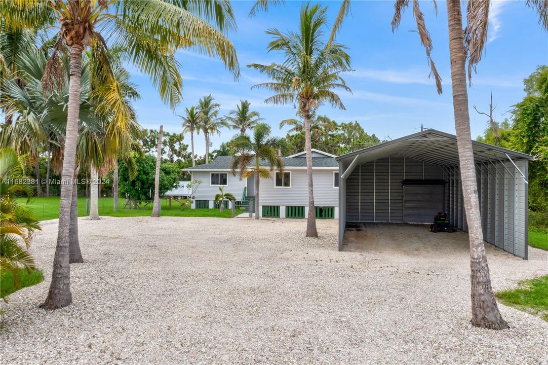 Front of house with huge open garage