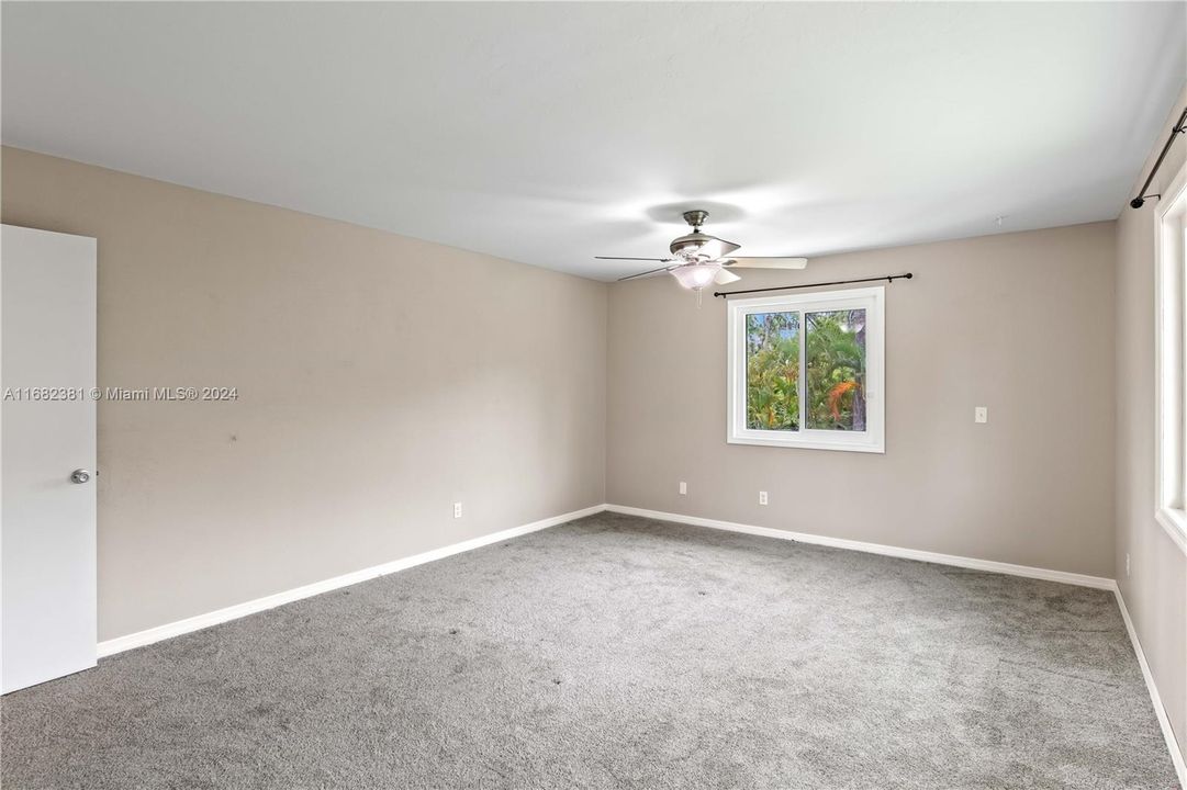 Master Bedroom with two big windows and lots of light