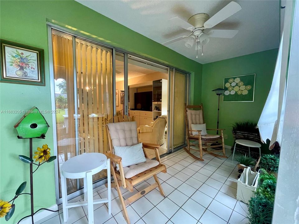 enclosed patio with sliding glass doors