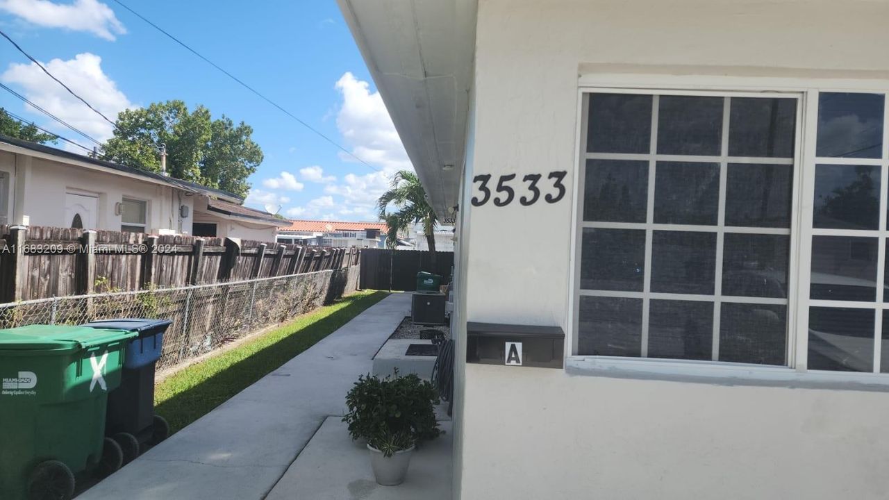 Hallway and mailbox of unit