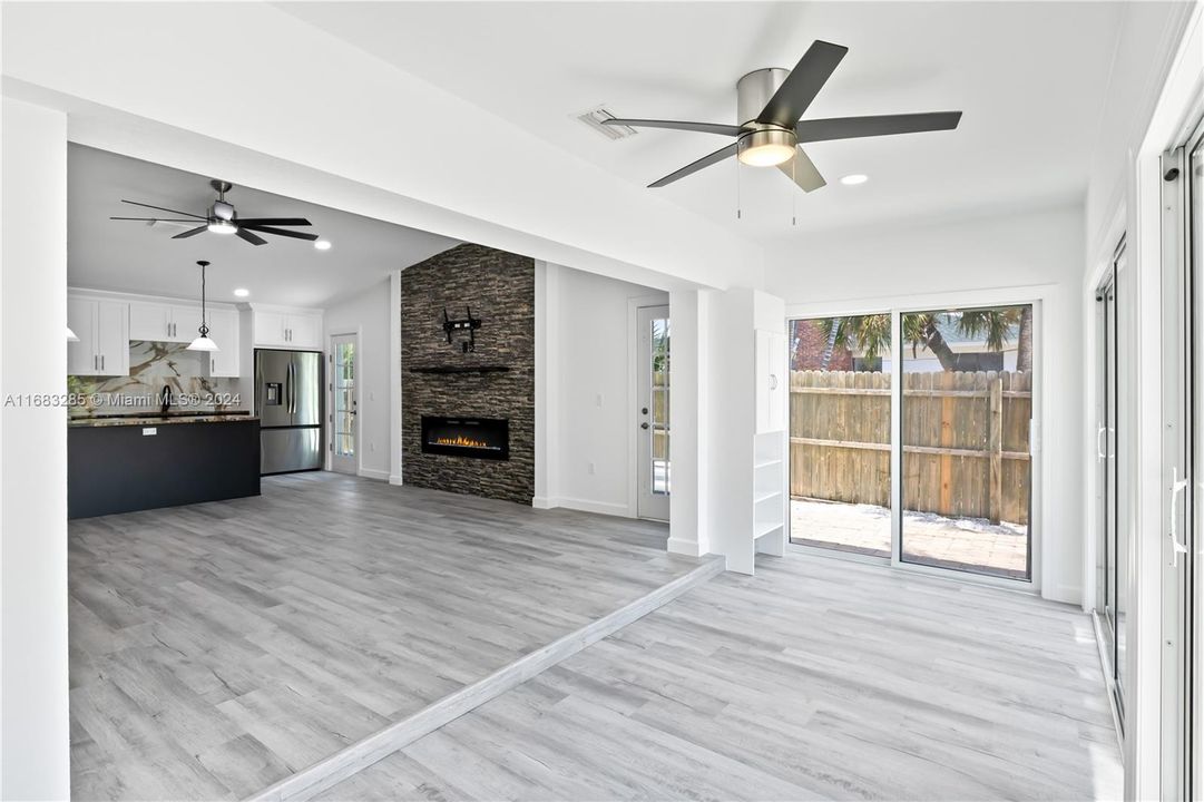 View of the sunroom and looking back to the great room and kitchen! What a perfect layout for entertaining!