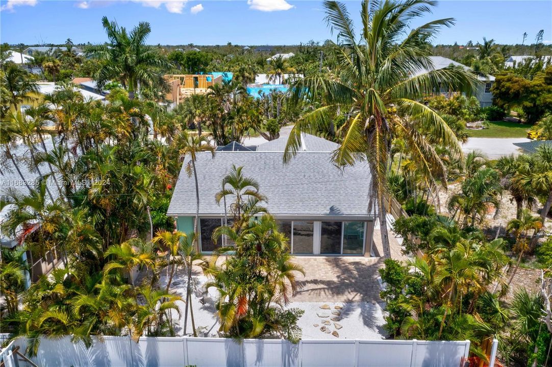 Picture perfect view of the backyard and beautiful landscaping!