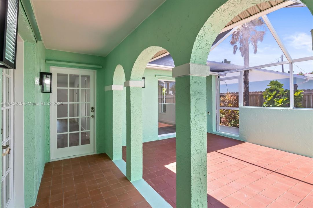 This courtyard is MAGIC!! Behind door # 1 is a separate guest bedroom and bathroom with two private entrances. The main home is behind door # 2! A perfect setup for a VRBO!