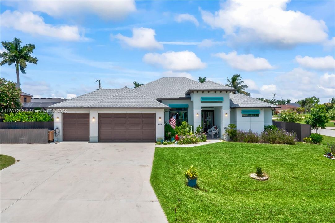 Corner lot with extensive driveway, Bahama shutters, corbels and so much more! Located just off Chiquita and close to Cape Coral Parkway and all the restaurants and night life!