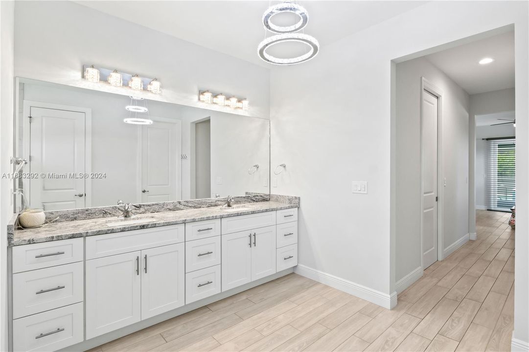 Master bathroom, looking into the bedroom.