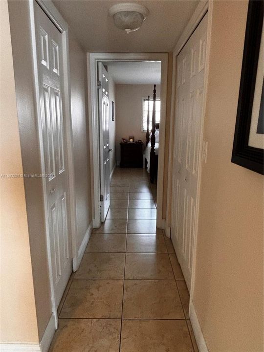 Hallway with 2 closets