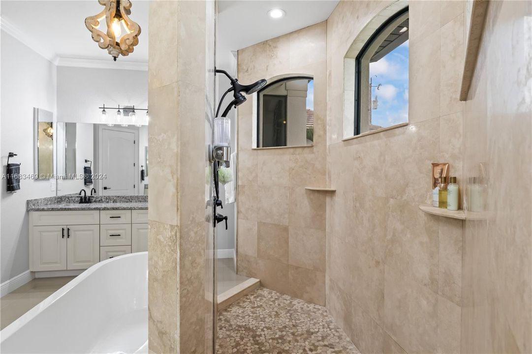 Spa like master bath with dual vanities, soaking tub and a large walk in shower. Functional and beautiful too!