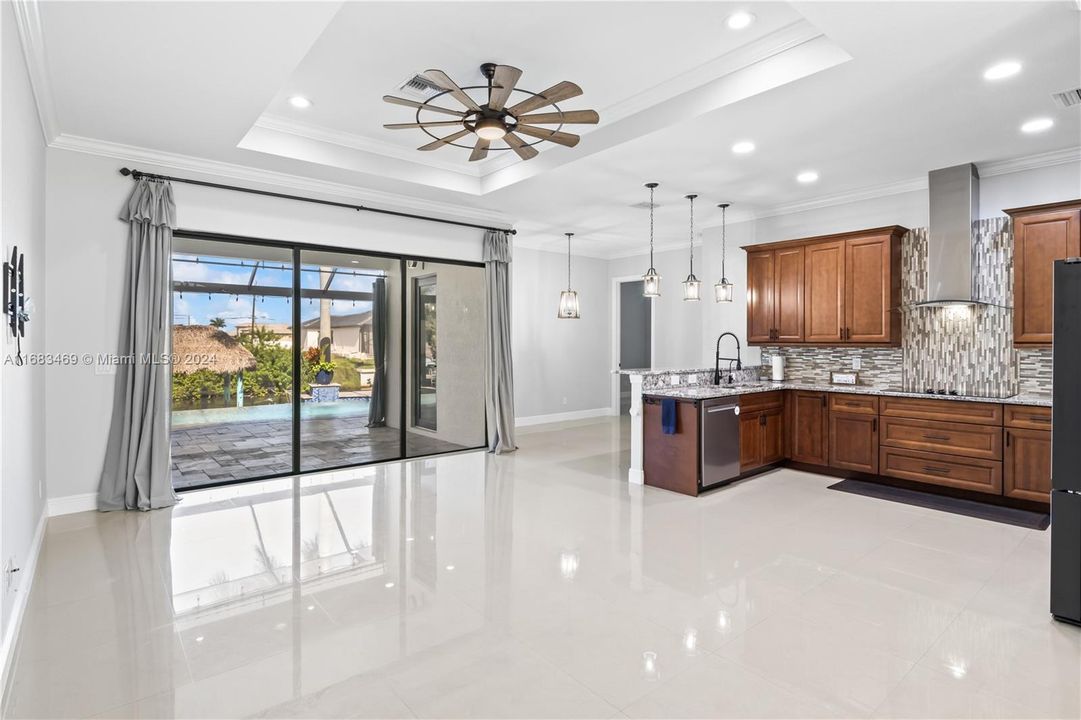 Another view of the kitchen, dining and outdoor patio area!