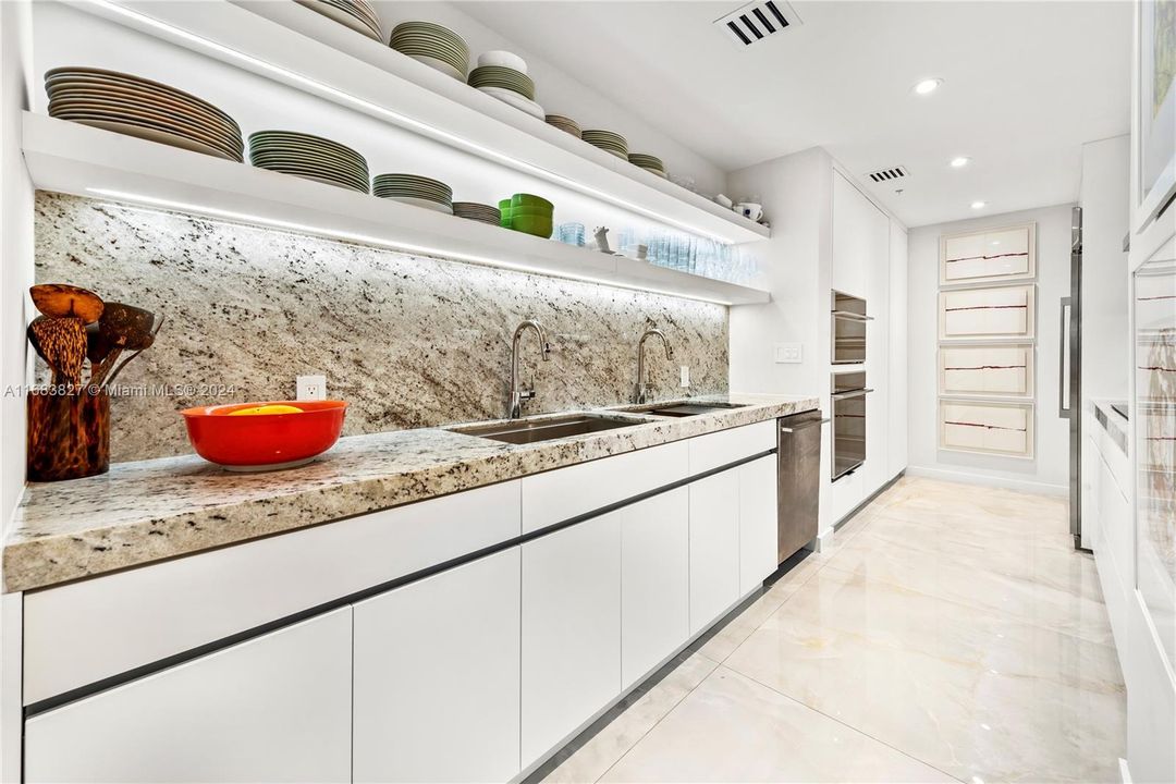 Fully Equipped Prep Kitchen Hidden Behind Primary Kitchen