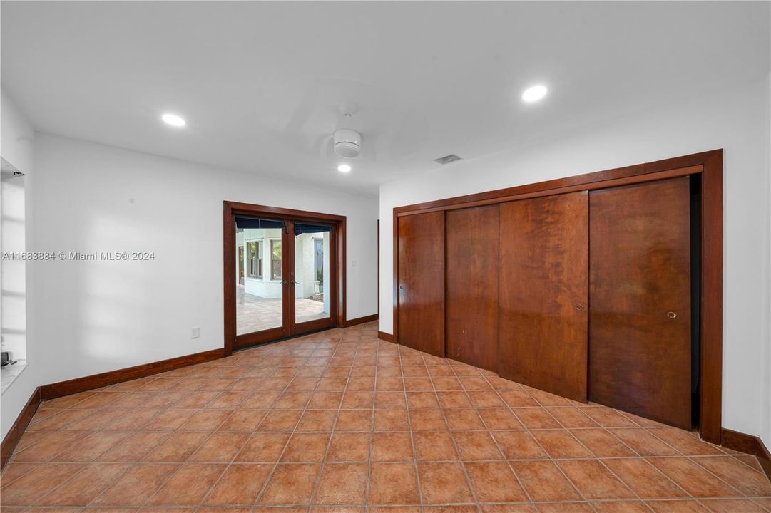 Large pool facing bedroom