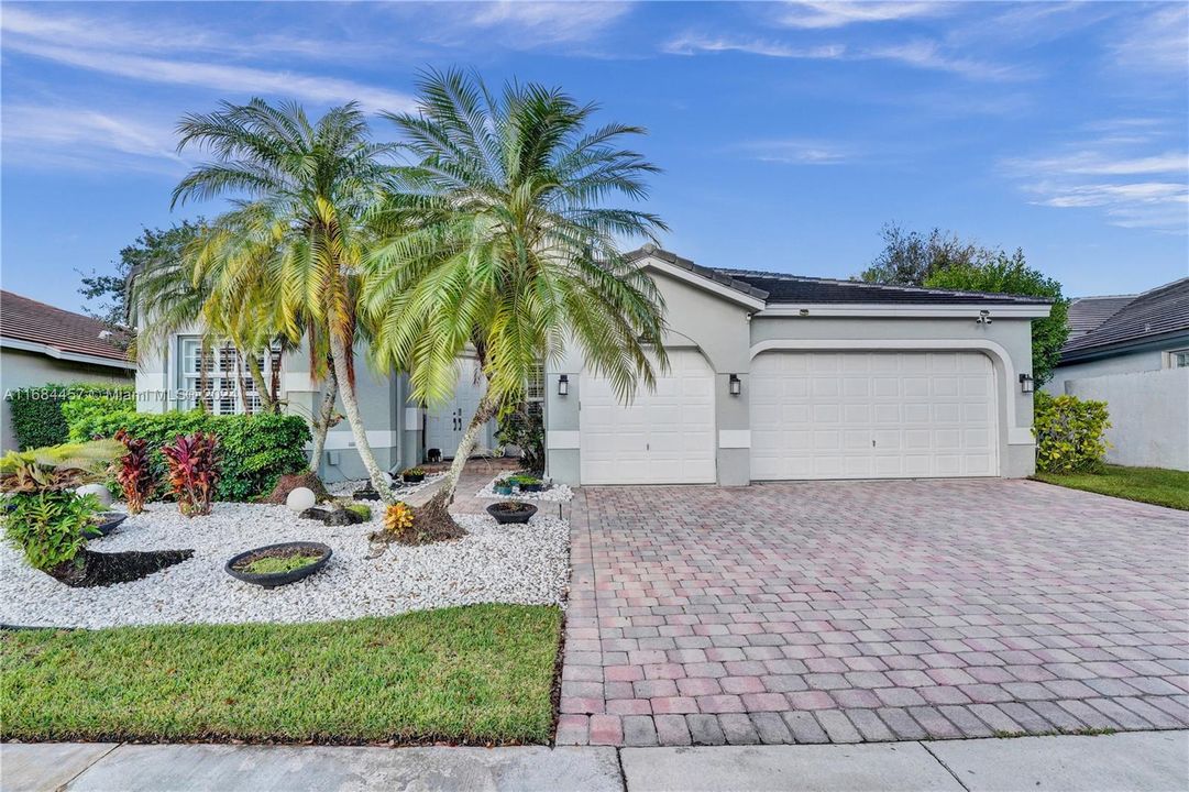 Welcome Home!  3 car garage, epoxy flooring in garage, lots of storage and more