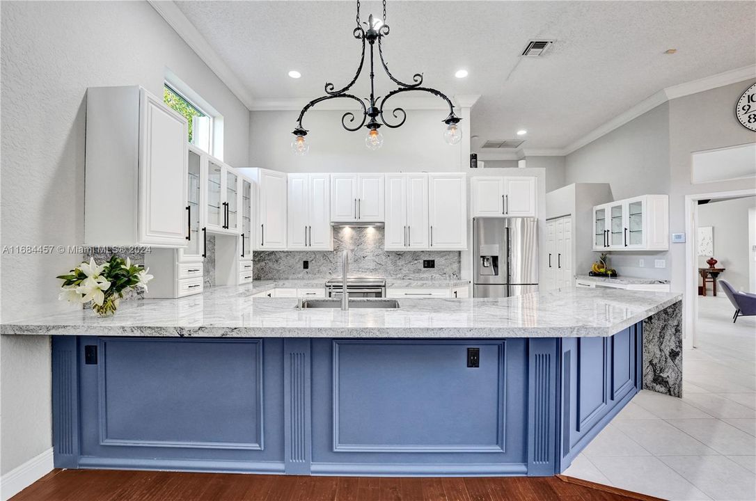 Lots of cabinets, large pantry overlooking the pool and lake.